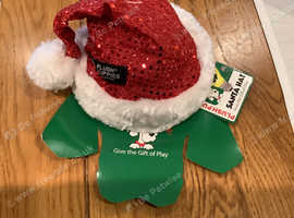 Plush puppies flashing santa hat