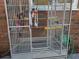 Big parrot cage for sale comes with food bowls and toys perks in good condition collection only