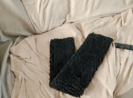 Black fluffy girth sleeve cover