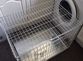 Medium dog crate ( if ad is still showing it's still for sale)