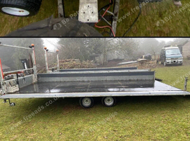 Tipping flat bed with sides