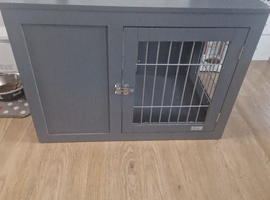 Grey dog wooden crate.