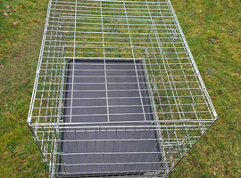 Large dog crate.