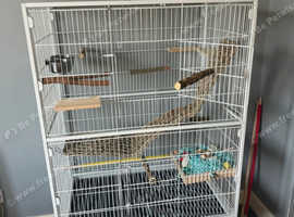 BRAND NEW BIRD CAGE AND USED TRAVEL CAGE