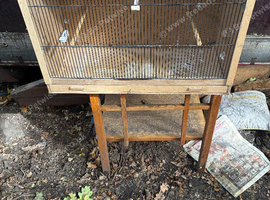 large wooden breeding cage