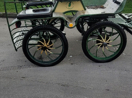 Four wheel carriage.