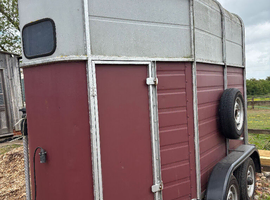Solid double pony trailer