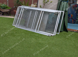 Large cage on wheels.