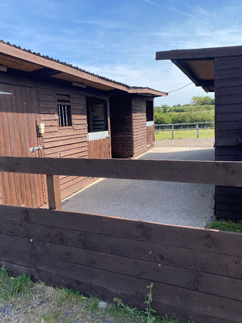 4 DIY stables with paddocks around 6 acres of grazing