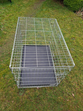 Large dog crate.