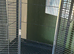 Corner parrot cage