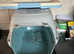 Xl puppy carrier case and portable training toilet