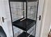 2 tall bird cages