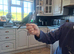 Beautiful hand reared turquoise green cheek conure with cage