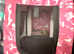 Pink dog carrier.