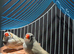 Pair of zebra finches with cage