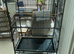Large bird flight cage, perches and feeder.